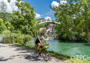 Cyclist along the Canal de Savière 