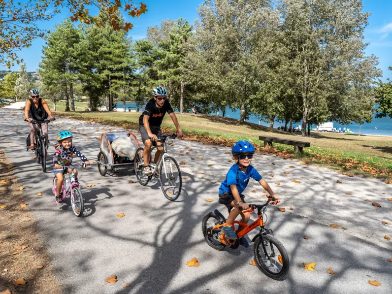 Family cycling on the green route